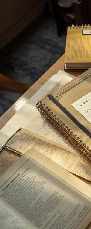 desk with journals on it